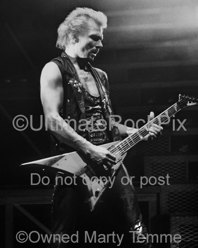 Photo of Rudolf Schenker of Scorpions in concert in 1991 by Marty Temme