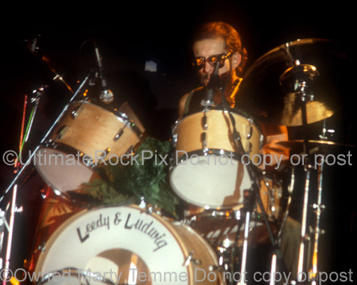 Photo of drummer Willie Wilcox of Todd Rundgren in concert in 1981 by Marty Temme