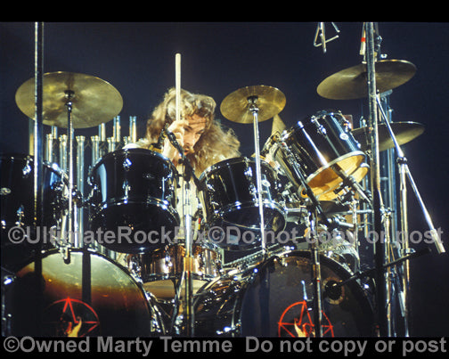 Photo of drummer Neil Peart in concert in 1978