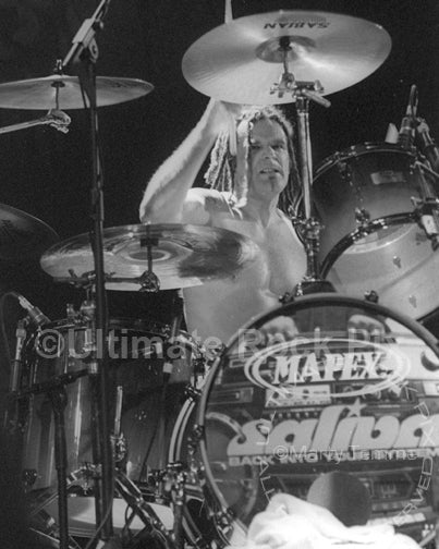 Photo of drummer Paul Crosby of Saliva in concert in 2003 by Marty Temme