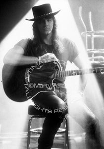 Black and white photo of Richie Sambora of Bon Jovi with an Ovation guitar by Marty Temme