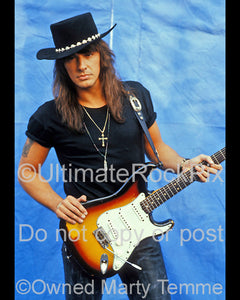 Photo of Richie Sambora of Bon Jovi with a Fender Stratocaster during a photo shoot in 1991 by Marty Temme