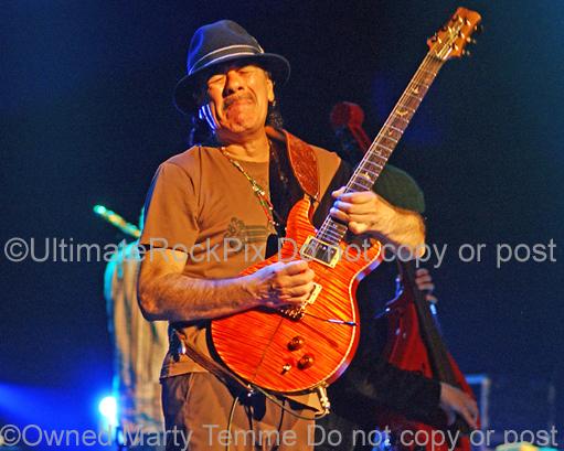 Photos of Guitarist Carlos Santana of Santana in Concert by Marty Temme