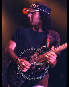 Photo of Joe Satriani in concert with Spinal Tap in 1992 by Marty Temme