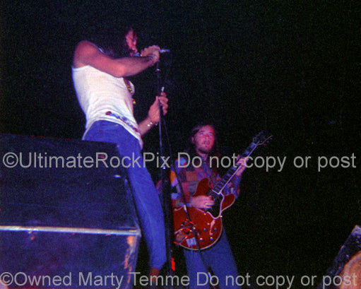 Photo of Dave Walker and Kim Simmonds of Savoy Brown in concert in 1972 by Marty Temme
