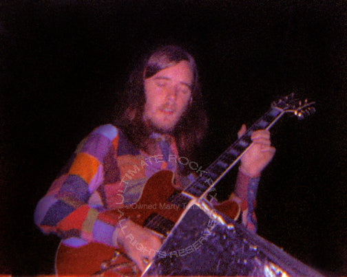 Photo of Kim Simmonds of Savoy Brown in concert in 1972 by Marty Temme