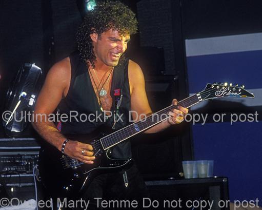 Photos of Guitarist Neal Schon of Bad English in Concert in 1989 by Marty Temme