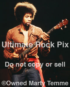 Photo of bassist Stanley Clarke of The New Barbarians in concert in 1979 by Marty Temme