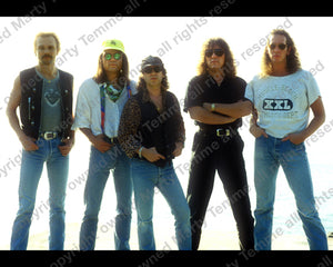 Photo of the band Scorpions during a photo shoot by Marty Temme