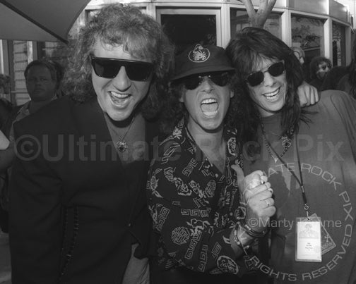 Photo of Herman Rarebell, Klaus Meine and Joe Leste in 1991 by Marty Temme