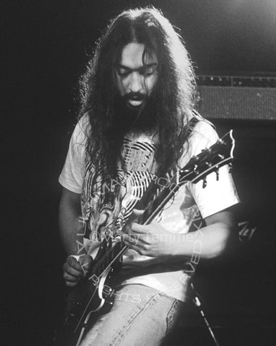 Black and white photo of Kim Thayil playing a black Les Paul in concert by Marty Temme