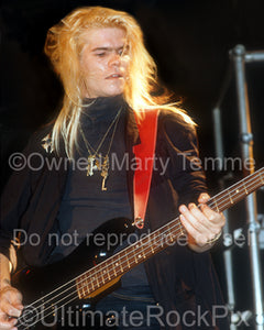 Photo of bassist Chris Heilman of Shark Island onstage in 1989 by Marty Temme