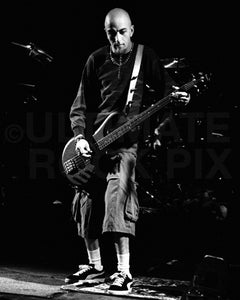 Photo of bass player Shavo Odadjian of System of a Down in concert by Marty Temme