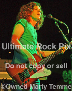 Photo of Ted Russell Kamp of Shooter Jennings in concert by Marty Temme