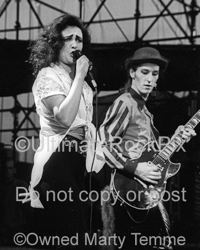 Photo of Siouxsie Sioux and Jon Klein in concert in 1991 by Marty Temme