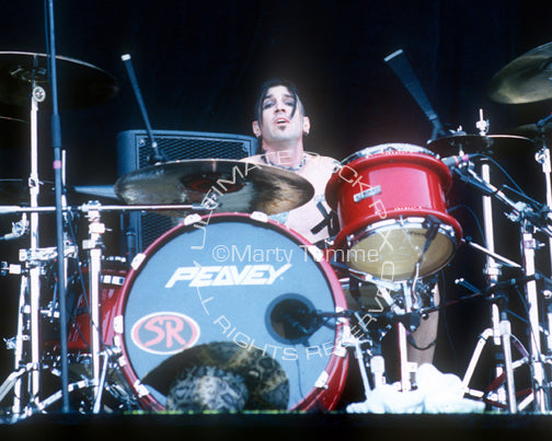 Photo of drummer Phil Varone of Skid Row in concert in 2000 by Marty Temme