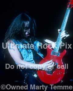 Photo of Scotti Hill of Skid Row in concert in 1989 by Marty Temme