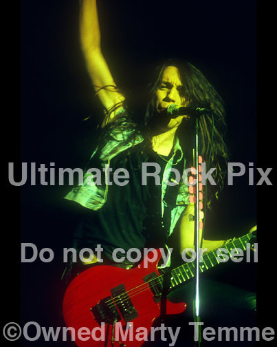 Photo of guitarist Scotti Hill of Skid Row in concert in 1989 by Marty Temme