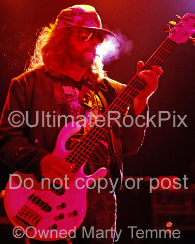 Photo of Leon Wilkeson of Lynyrd Skynyrd in concert in 1991 by Marty Temme