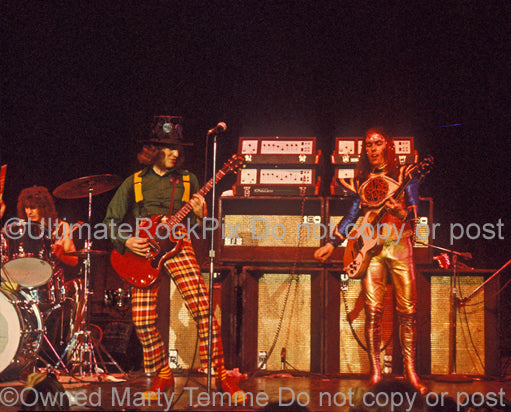 Photo of Don Powell, Noddy Holder and Dave Hill of Slade in 1973 by Marty Temme