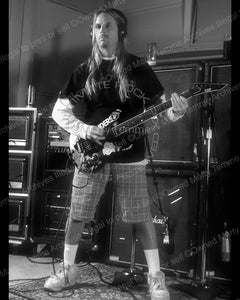 Black and white photo of Jeff Hanneman of Slayer during a photo shoot in 1998