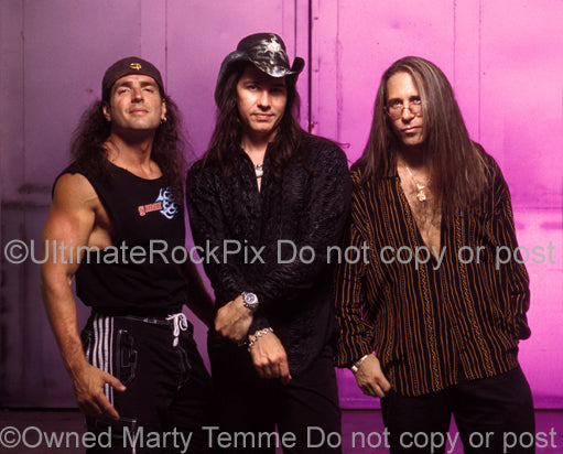 Photo of Bobby Rock, Mark Slaughter and Dana Strum of Slaughter during a photo shoot in 2003 in Hollywood, California by Marty Temme