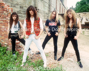 Photo of the band Slaughter during a location shoot in Detroit in 1990 by Marty Temme