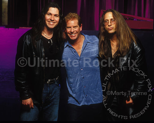 Photo of Mark Slaughter, Brad Gillis and Dana Strum during a photo shoot in 2005 by Marty Temme