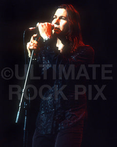 Photo of singer Mark Slaughter of Slaughter in concert in 2003 by Marty Temme