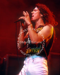 Photo of Mark Slaughter of Slaughter in concert in 1990 by Marty Temme