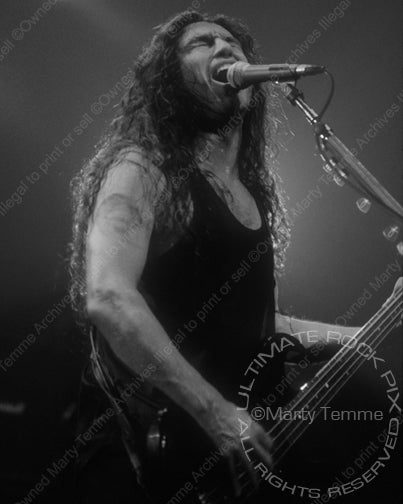   Black and white photo of Tom Araya of Slayer in concert by Marty Temme