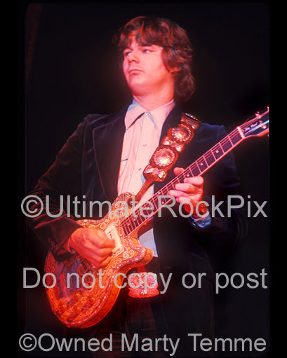 Photo of guitar player Steve Miller in concert in 1974 by Marty Temme