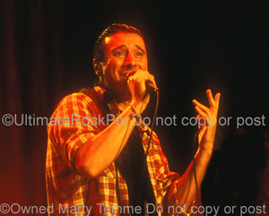Photo of vocalist Steve Perry of Journey in concert in 1994 by Marty Temme