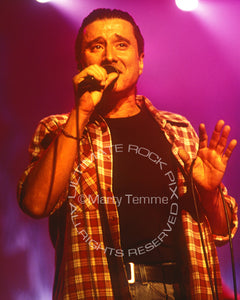 Photo of Steve Perry of Journey in concert in 1994 by Marty Temme