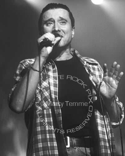 Black and white photo of Steve Perry of Journey in concert in 1994 by Marty Temme
