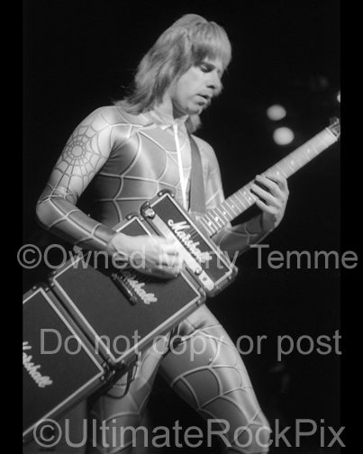 Photo of guitarist Nigel Tufnel in concert with Spinal Tap in 1992 by Marty Temme