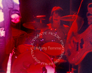 Photo of John Barbata of Jefferson Starship in concert in 1975 by Marty Temme