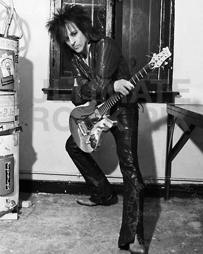 Black and white photo of Steve Stevens during a photo shoot by Marty Temme