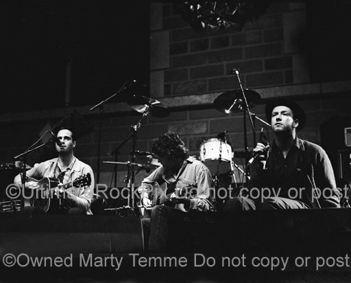 Black and white photo of Scott Weiland and Stone Temple Pilots onstage in 1994 by Marty Temme