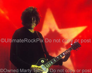 Photos of Guitarist Dean DeLeo of Stone Temple Pilots Playing a Gibson Les Paul Standard in Concert in 2000 by Marty Temme