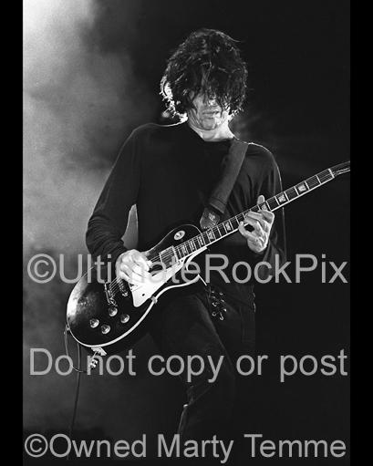 Black and White Photos of Guitarist Dean DeLeo of Stone Temple Pilots Playing a Gibson Les Paul Standard in Concert in 2000 by Marty Temme