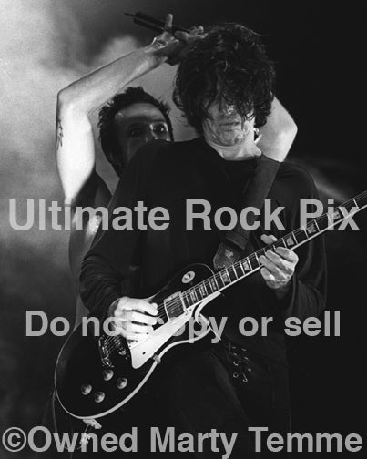 Black and white photo of Scott Weiland and Dean Deleo of Stone Temple Pilots in 2000 by Marty Temme