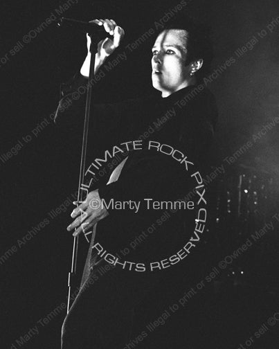 Black and white photo of Scott Weiland of Stone Temple Pilots performing onstage by Marty Temme