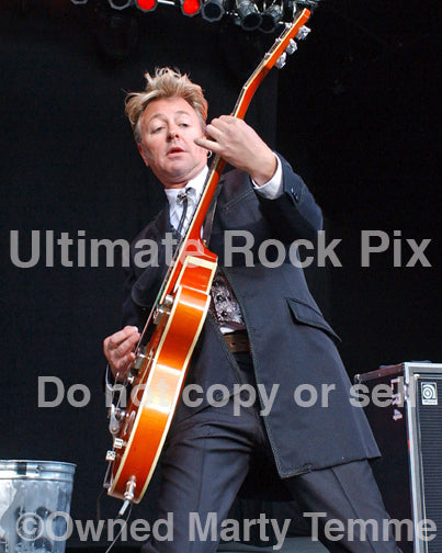 Photo of guitarist Brian Setzer of The Stray Cats in concert by Marty Temme