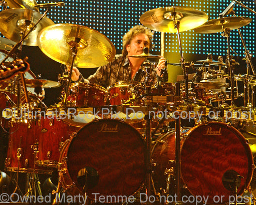 Photo of drummer Todd Sucherman of Styx in concert by Marty Temme