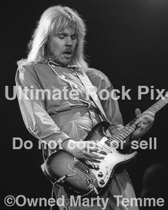 Photo of James "JY" Young of Styx playing a Stratocaster in concert in 1979 by Marty Temme