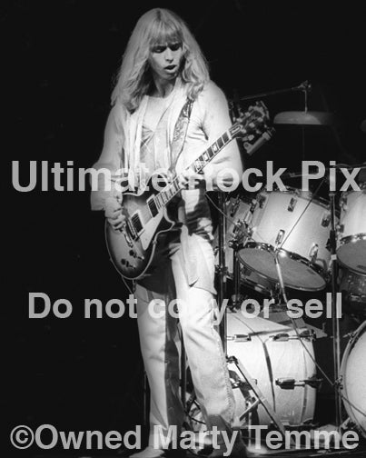 Black and white photo of Tommy Shaw of Styx in concert in 1978 by Marty Temme