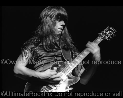 Photo of guitarist Andy Scott of The Sweet in concert in 1976 by Marty Temme