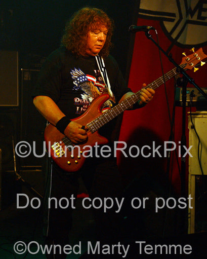 Photo of Steve Priest of The Sweet in concert in 2008 by Marty Temme