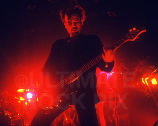 Photo of bassist Jim Sellers of Stabbing Westward in concert in 1995 by Marty Temme